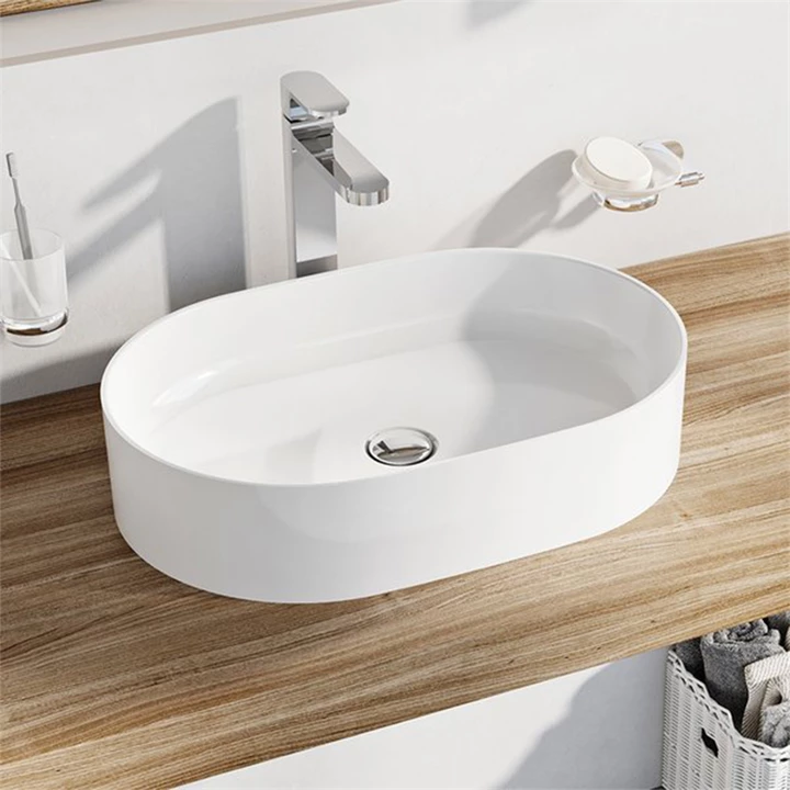 Ravak Mosdó Ceramic 550 O Slim, kerámia, fehér XJX01155001